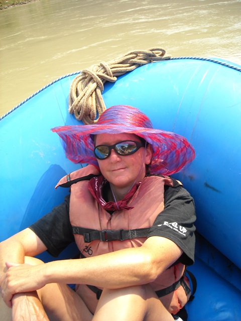 Julie relaxing while rafting the Grand Canyon-web